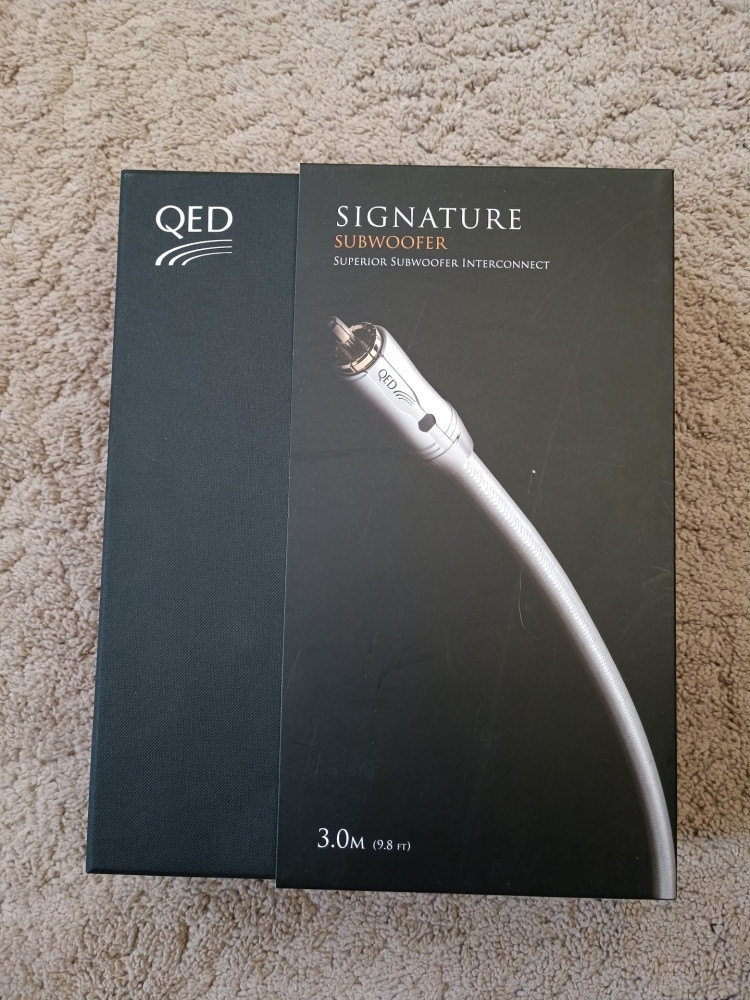 QED Signature sub.jpg